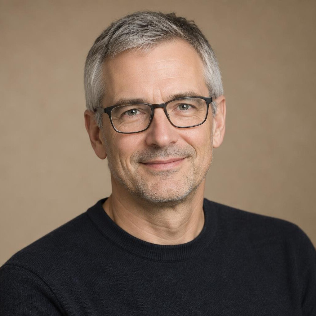 Studio portrait of a German man researcher in his fifties